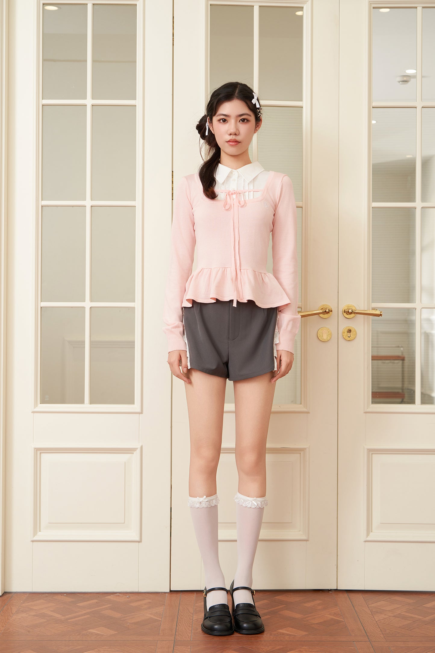 layered peplum knit top