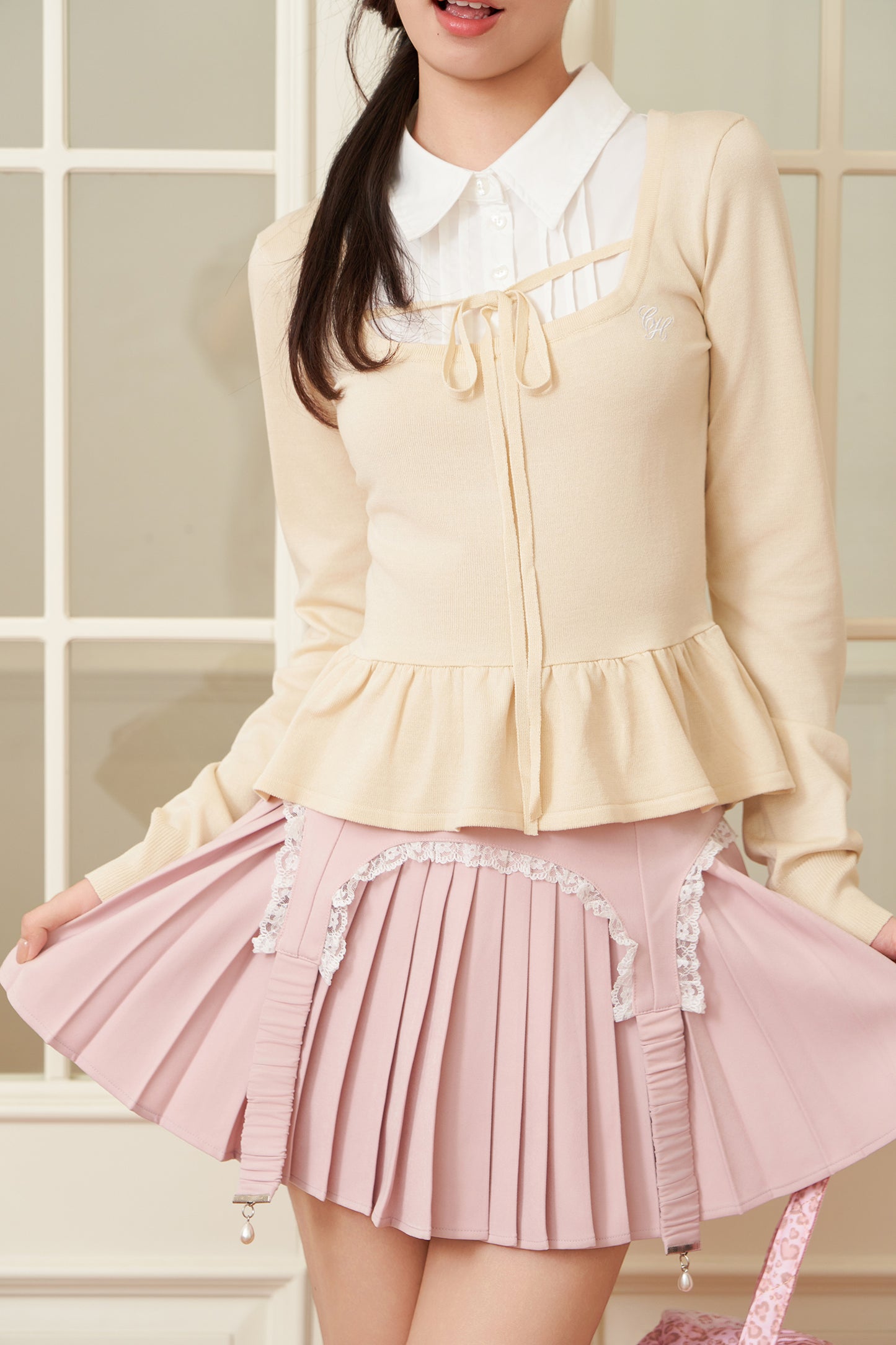 layered peplum knit top