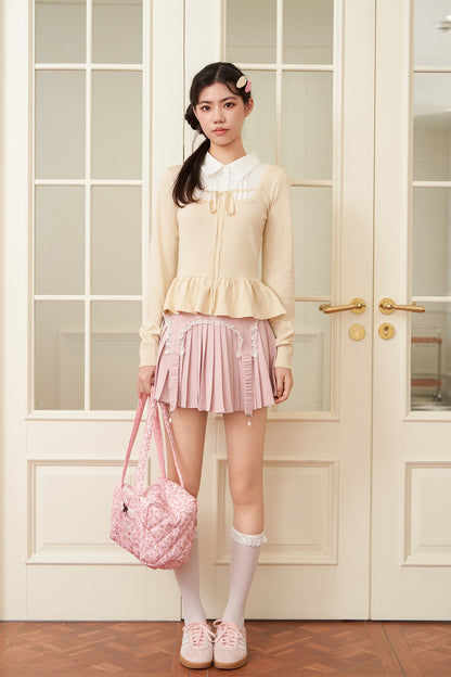 layered peplum knit top